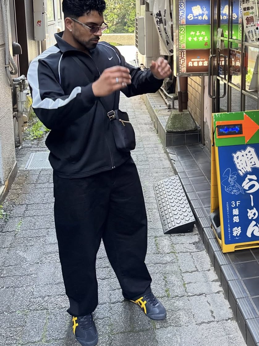 Black tracksuit in a Tokyo alley